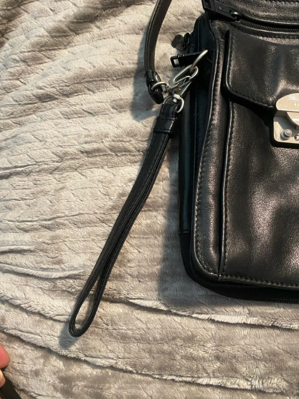 TUMI Black Leather Messenger Bag with Silver Hardware